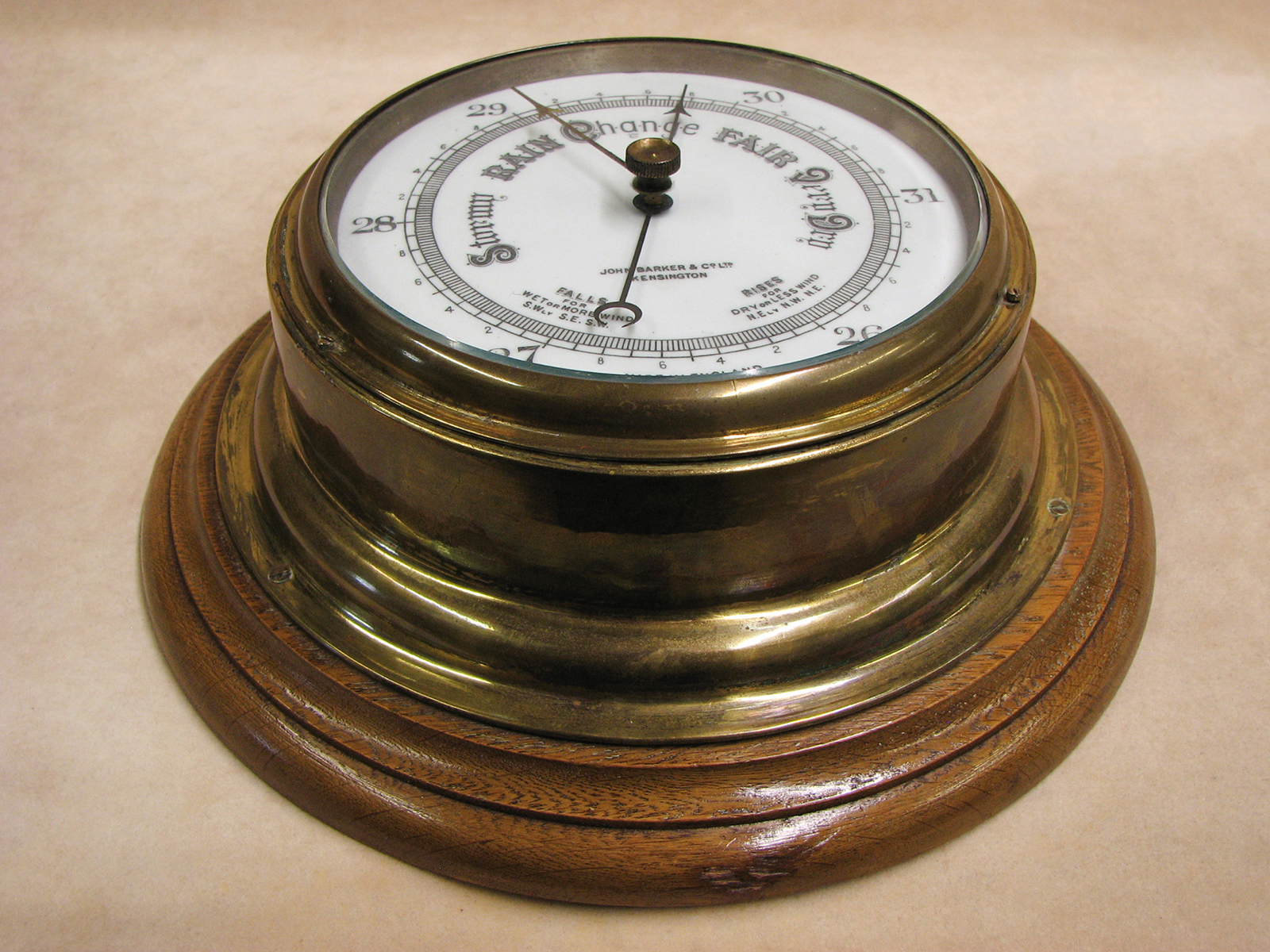 Antique Ships aneroid bulkhead barometer signed John Barker Kensington